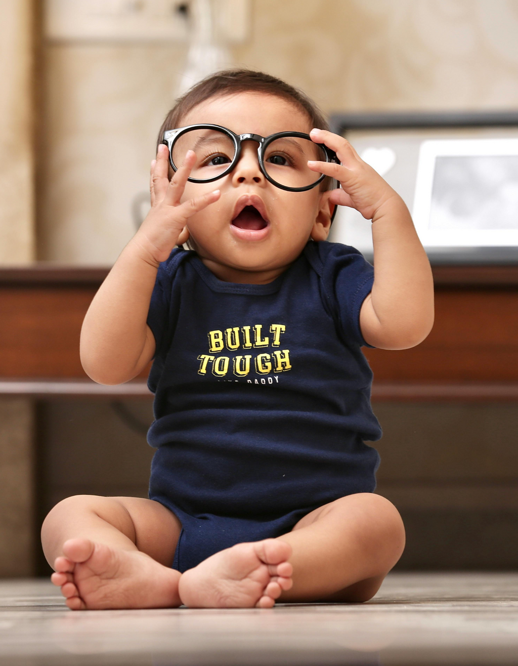 Soft cotton baby onesie/romper for ages 0-12 months with cute print