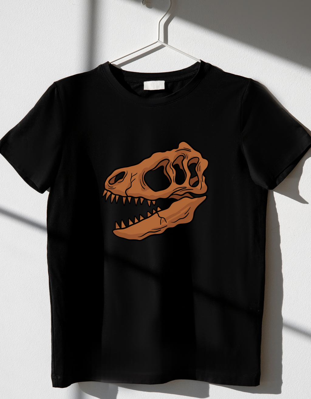 Dino Skull cotton T-shirt – flat lay kids tee with dinosaur print