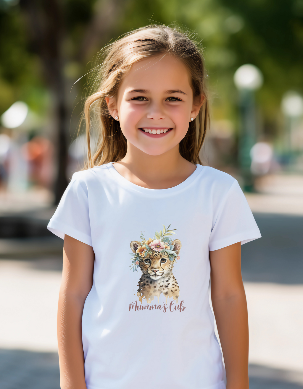 Child wearing Mumma’s Cub cotton T-shirt with logo print