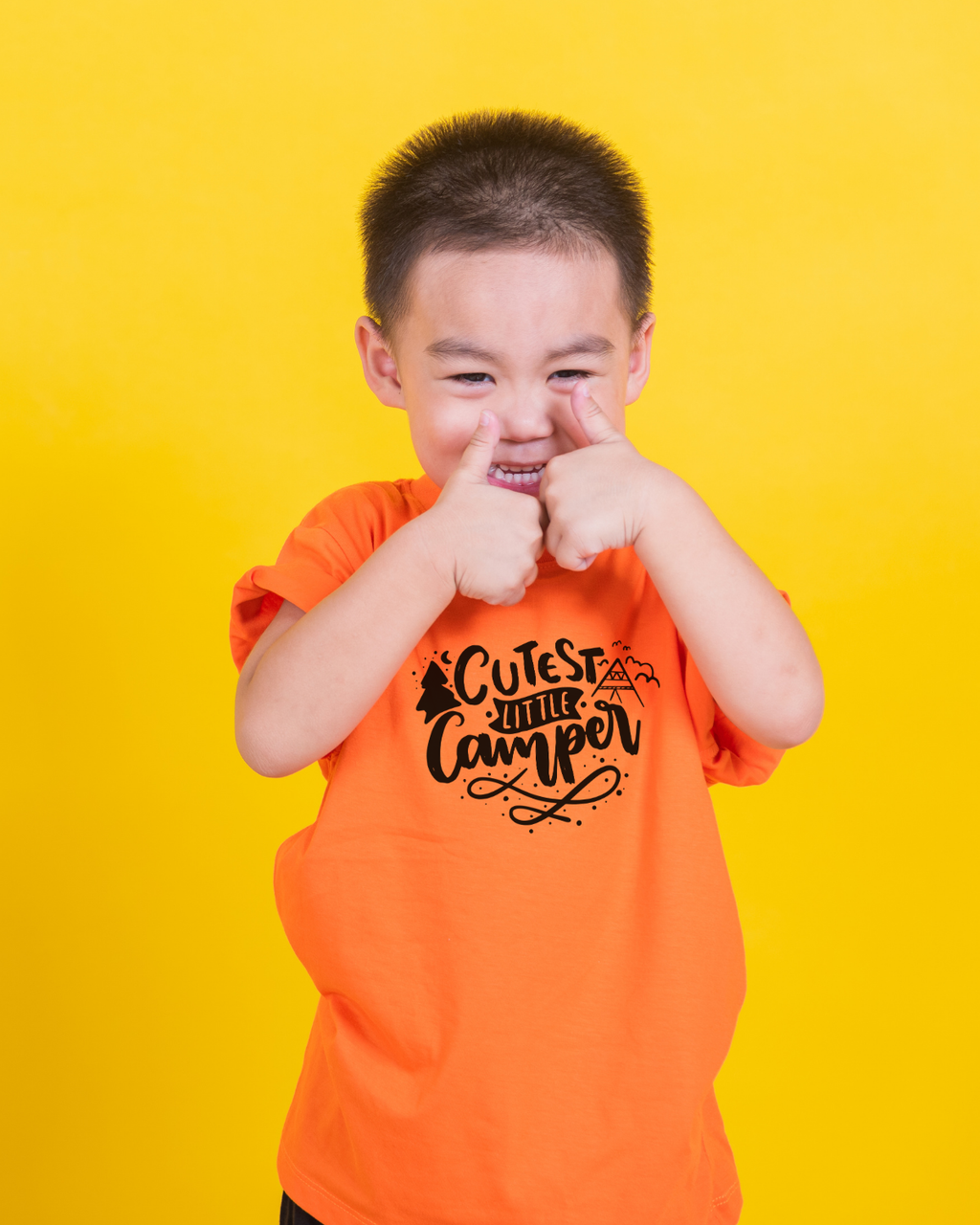 Kids cotton T-shirt with “Cutest Little Camper” print and outdoor-themed design