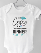 baby onesie with text "I'm not crying I'm ordering dinner