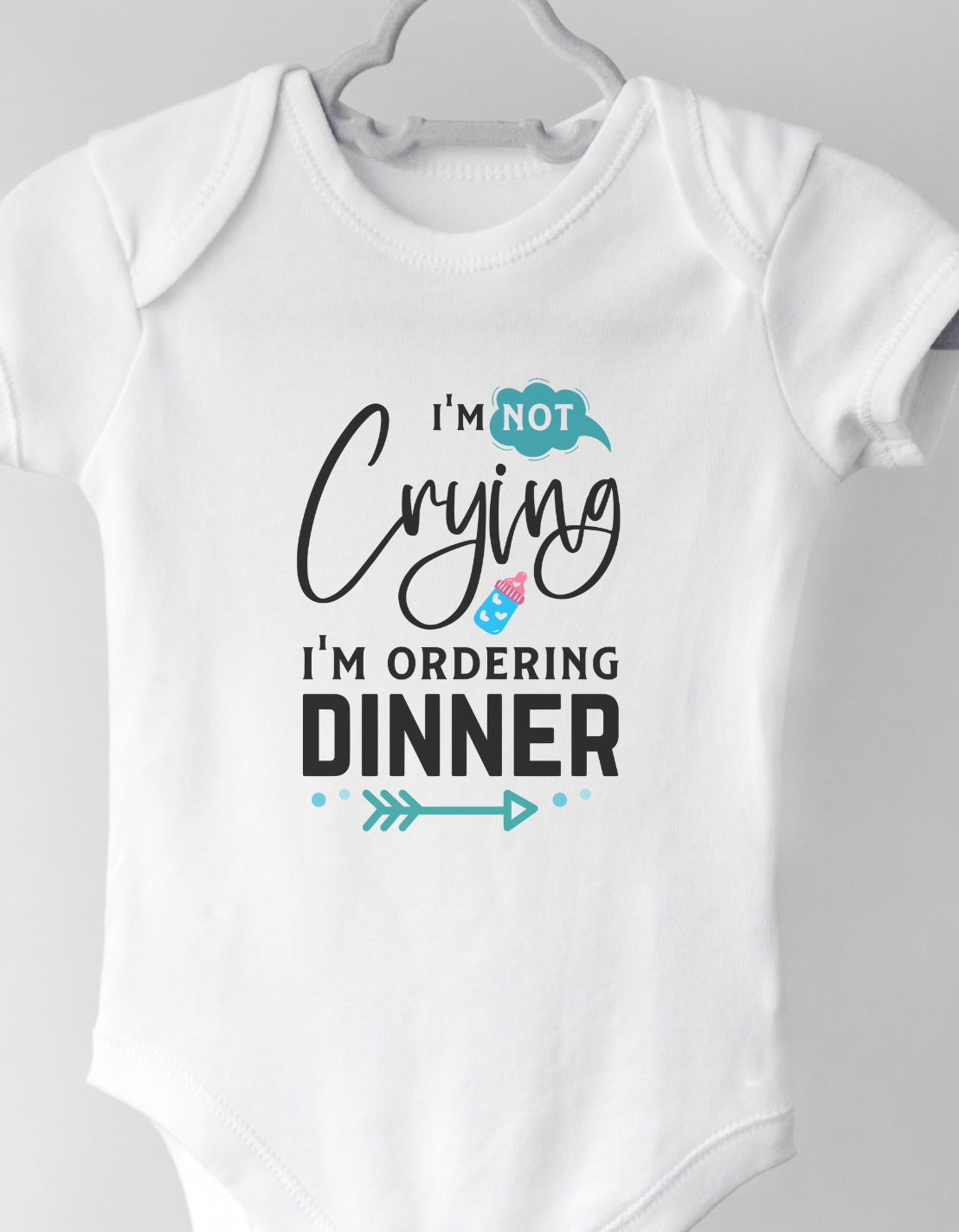 baby onesie with text "I'm not crying I'm ordering dinner