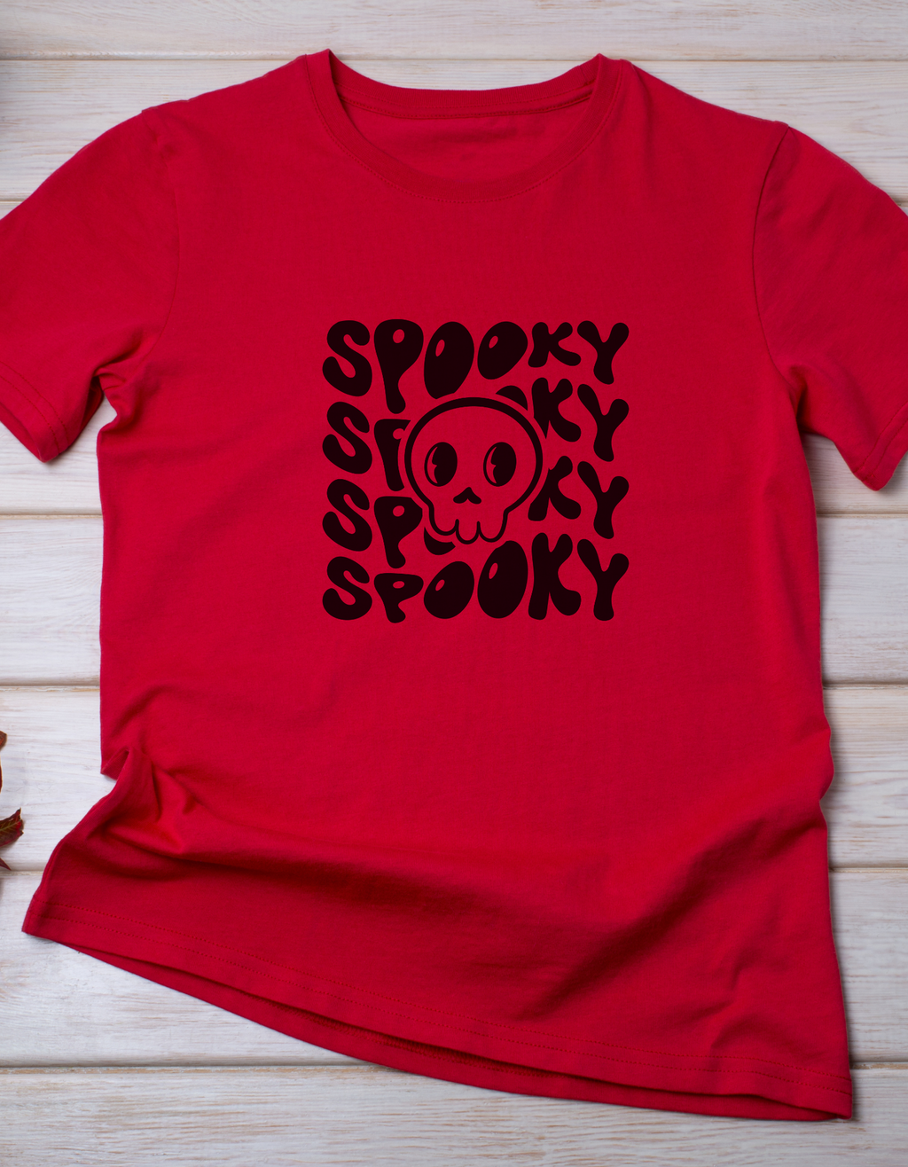 Spooky cotton T-shirt – flat lay Halloween-themed kids tee