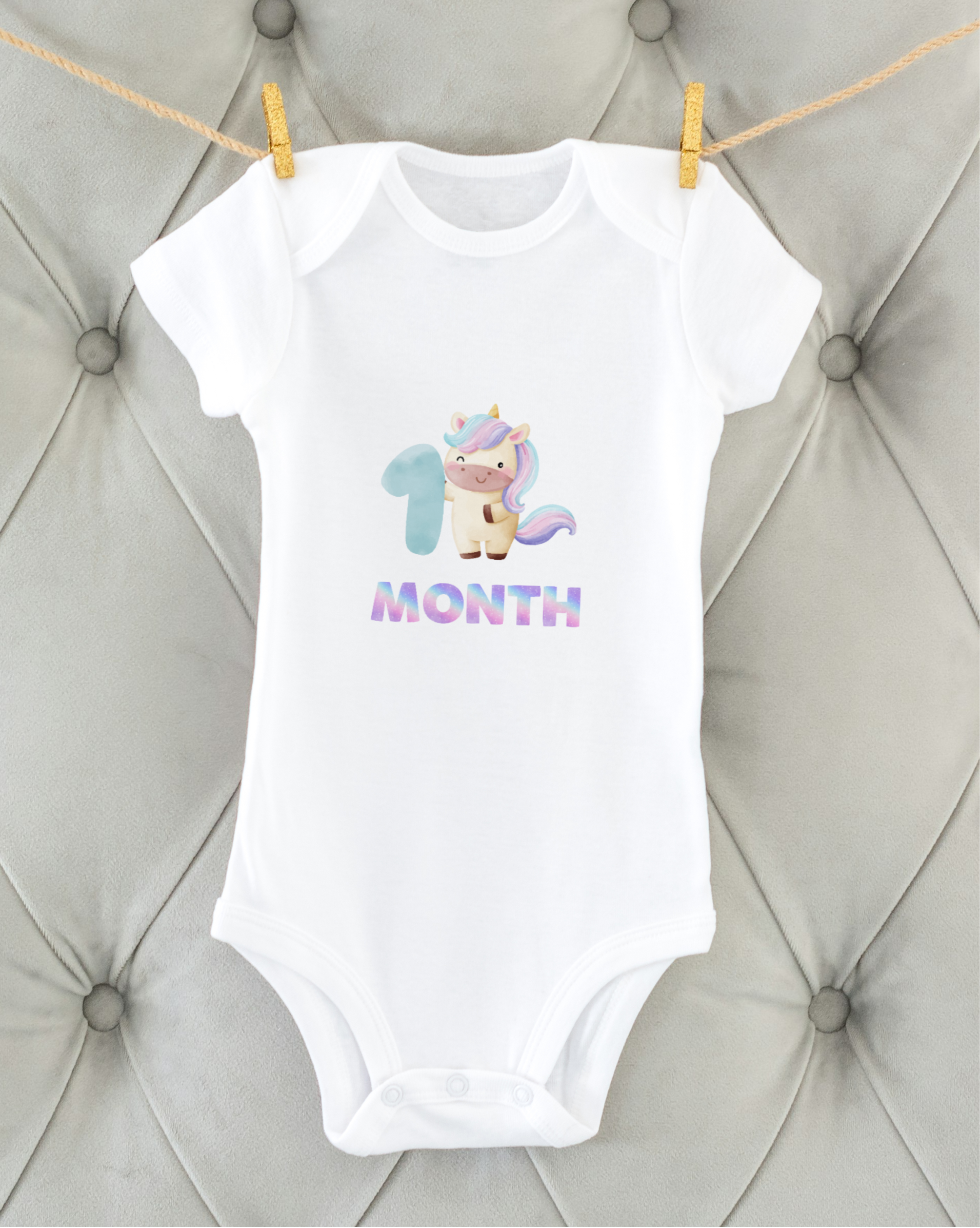 1st Month Unicorn baby onesie – flat lay cotton romper by Mumma’s Cub