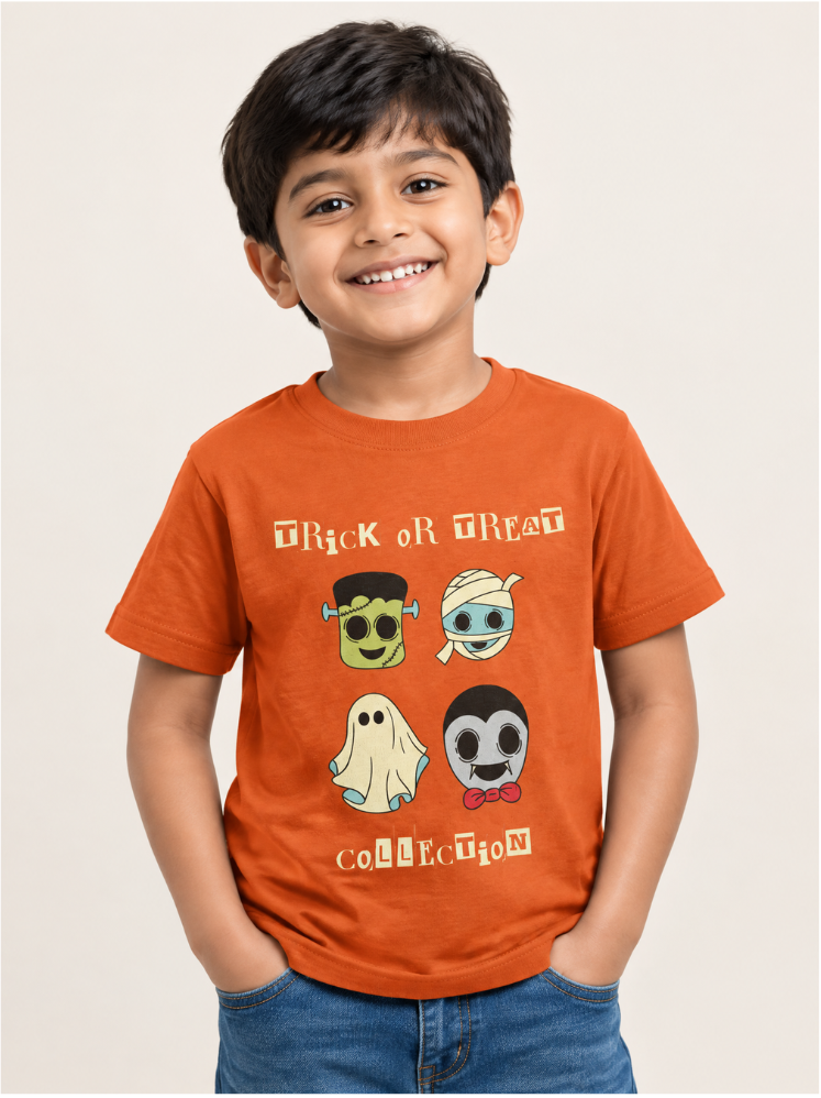 A smiling young boy wearing a bright orange graphic t-shirt with cartoon characters and the text 'Trick or Treat' collection.