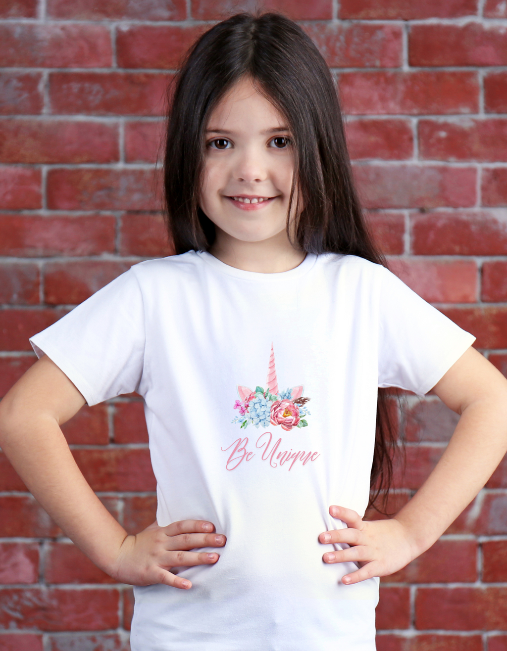 Girl wearing Be Unique Unicorn T-shirt – cute and colorful unicorn print