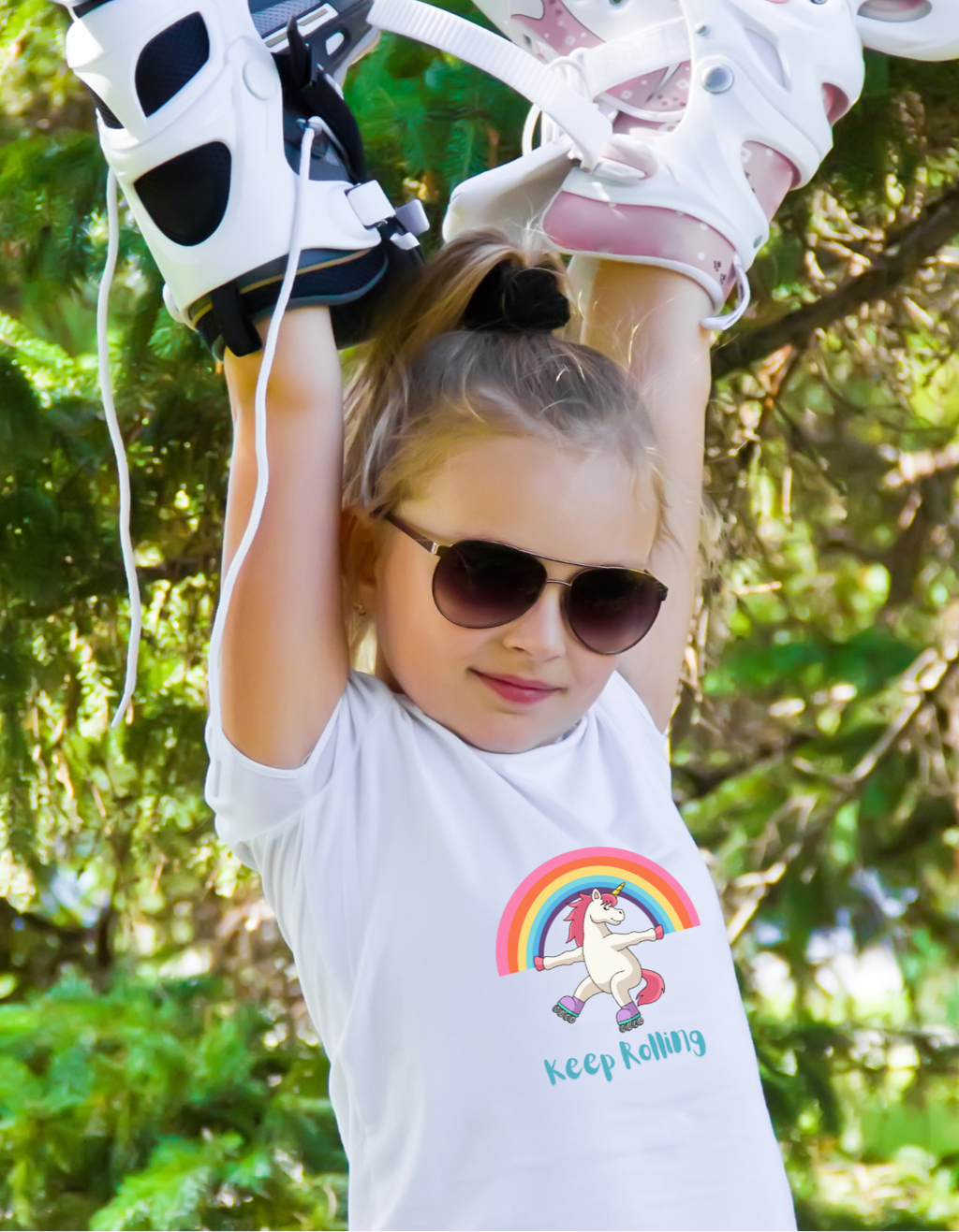 Child wearing Keep Rolling cotton T-shirt