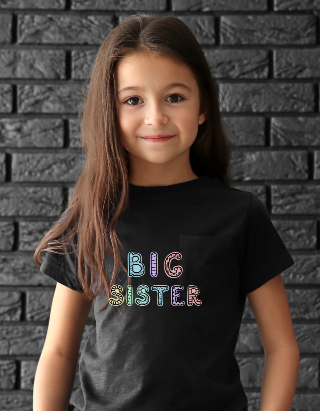 Girl wearing Big Sis T-shirt – cute and comfy sibling celebration shirt