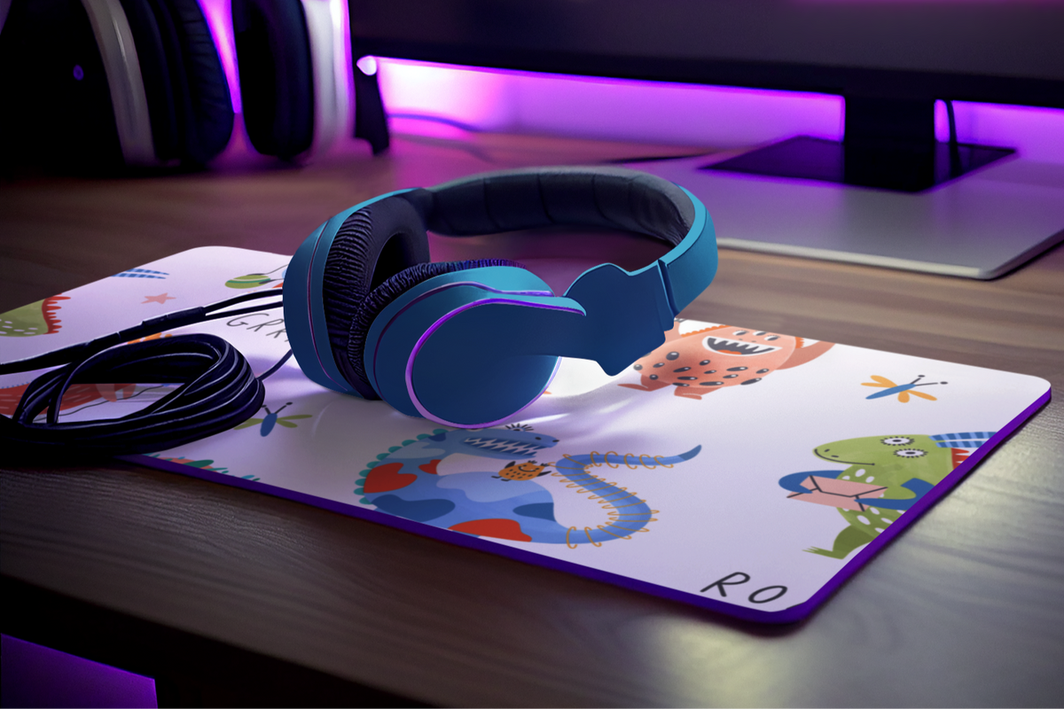 Monsters print gaming pad with stitched edges, anti-slip grip, and smooth surface for precise gaming control