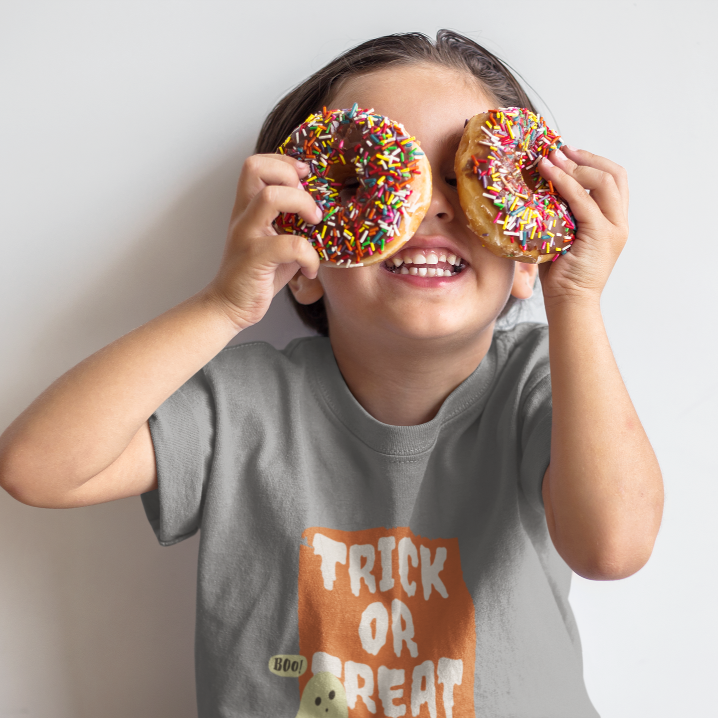 Kids cotton Halloween T-shirt with ghost print and text “Trick or Treat”