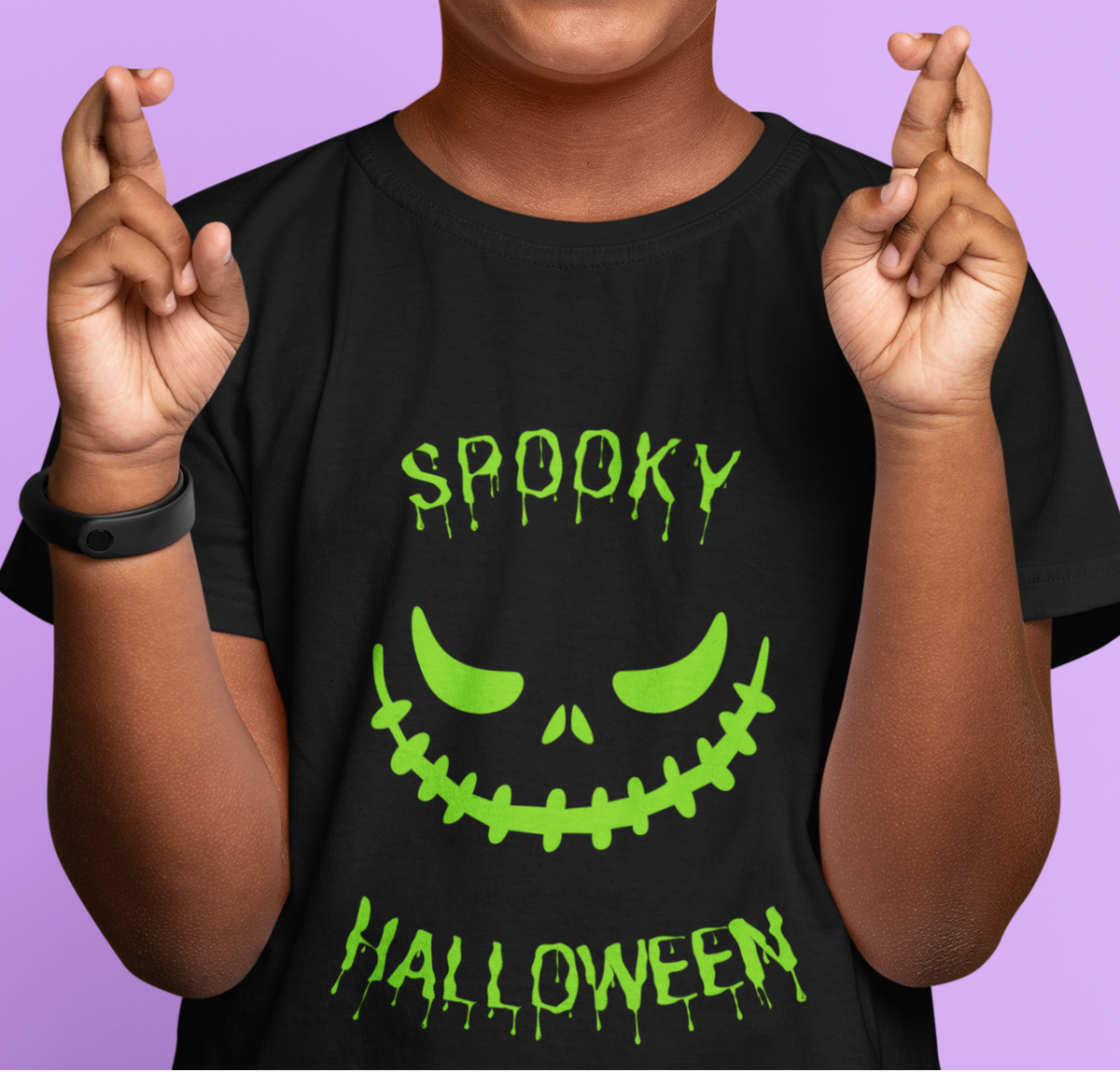Kids unisex cotton Halloween T-shirt with spooky smile graphic and text “Spooky Halloween”