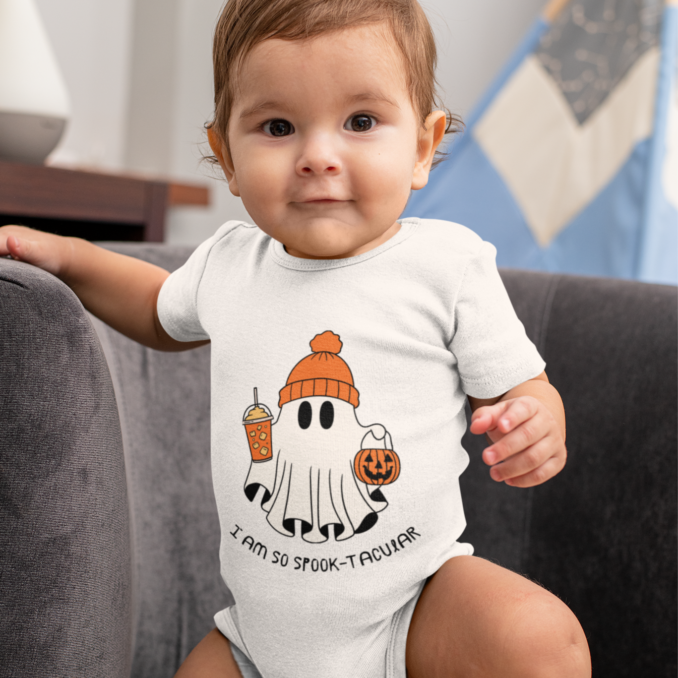 Baby soft cotton Halloween romper with ghost wearing winter cap and text “I Am So Spook-tacular”