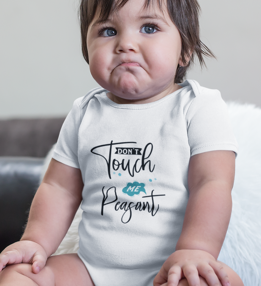 Baby wearing super combed cotton romper with “don’t touch me peasant” quote by Mumma’s Cub