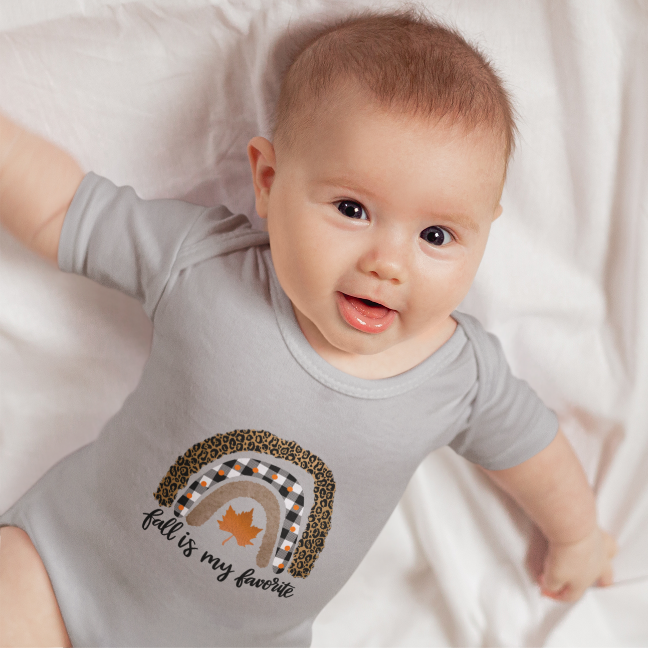 Baby soft cotton Halloween romper with boho rainbow print and text “Fall is My Favourite”