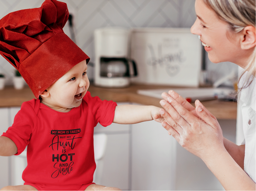 Baby wearing super combed cotton romper with funny family quote by Mumma’s Cub