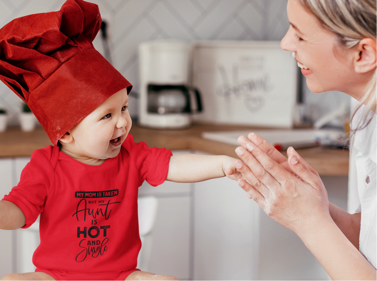 Baby wearing super combed cotton romper with funny family quote by Mumma’s Cub