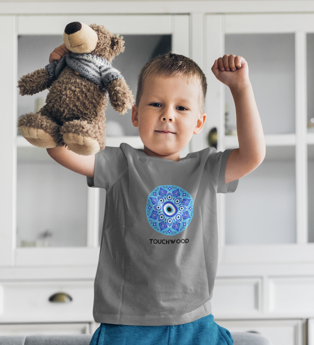 Kids cotton t-shirt with blue evil eye Touchwood print by Mumma’s Cub