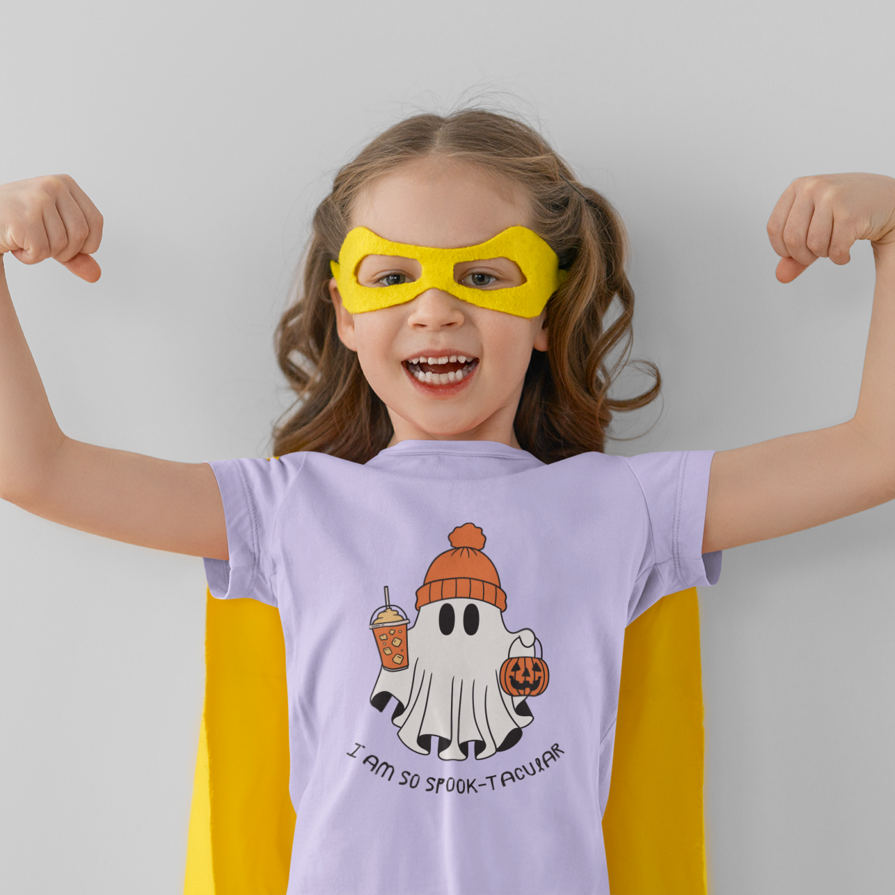 Kids Halloween cotton T-shirt with ghost in winter cap and text “I am so spook-tacular”