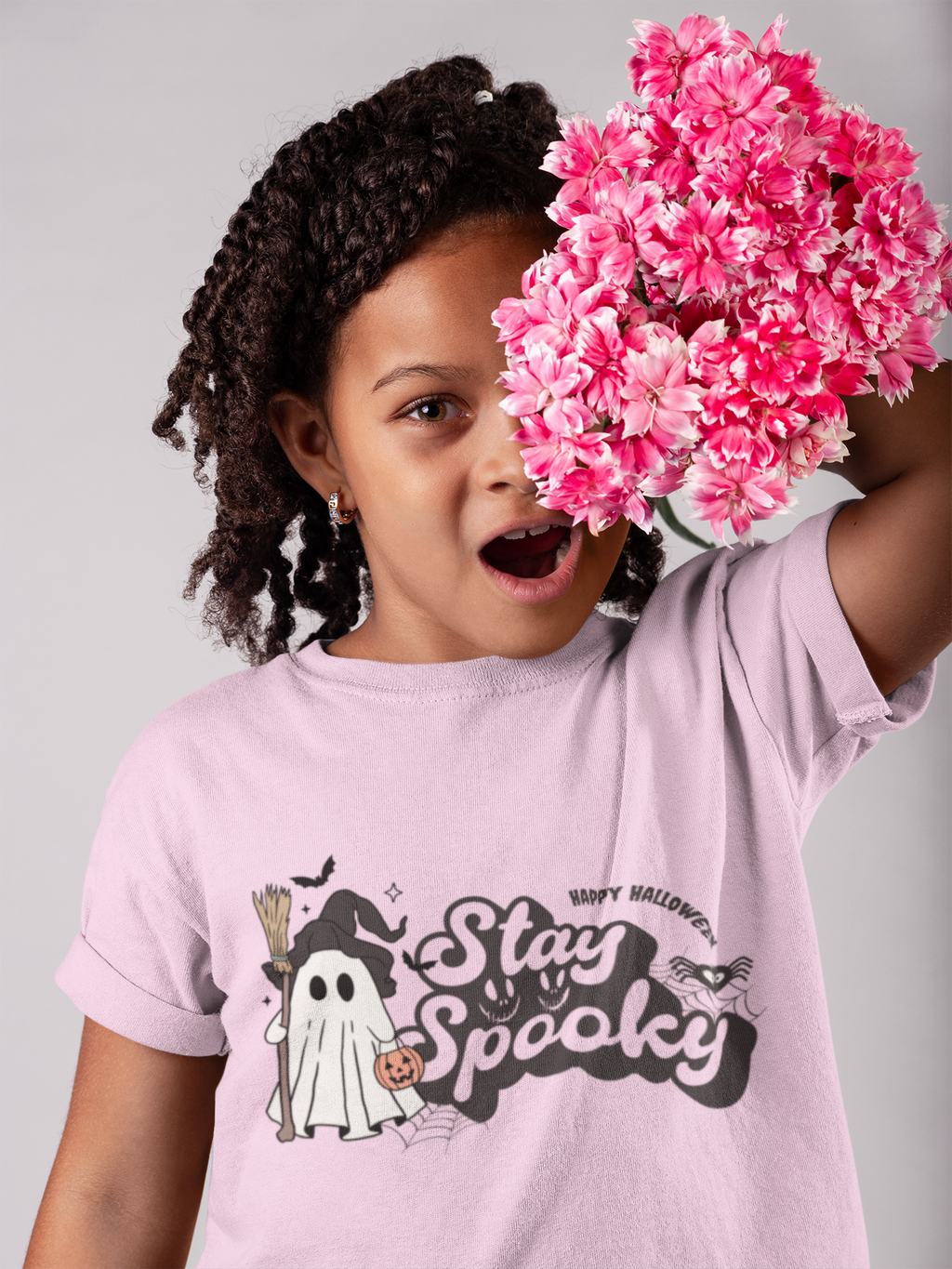 Kids unisex cotton Halloween T-shirt with ghost in witch hat holding broom and “Stay Spooky” print