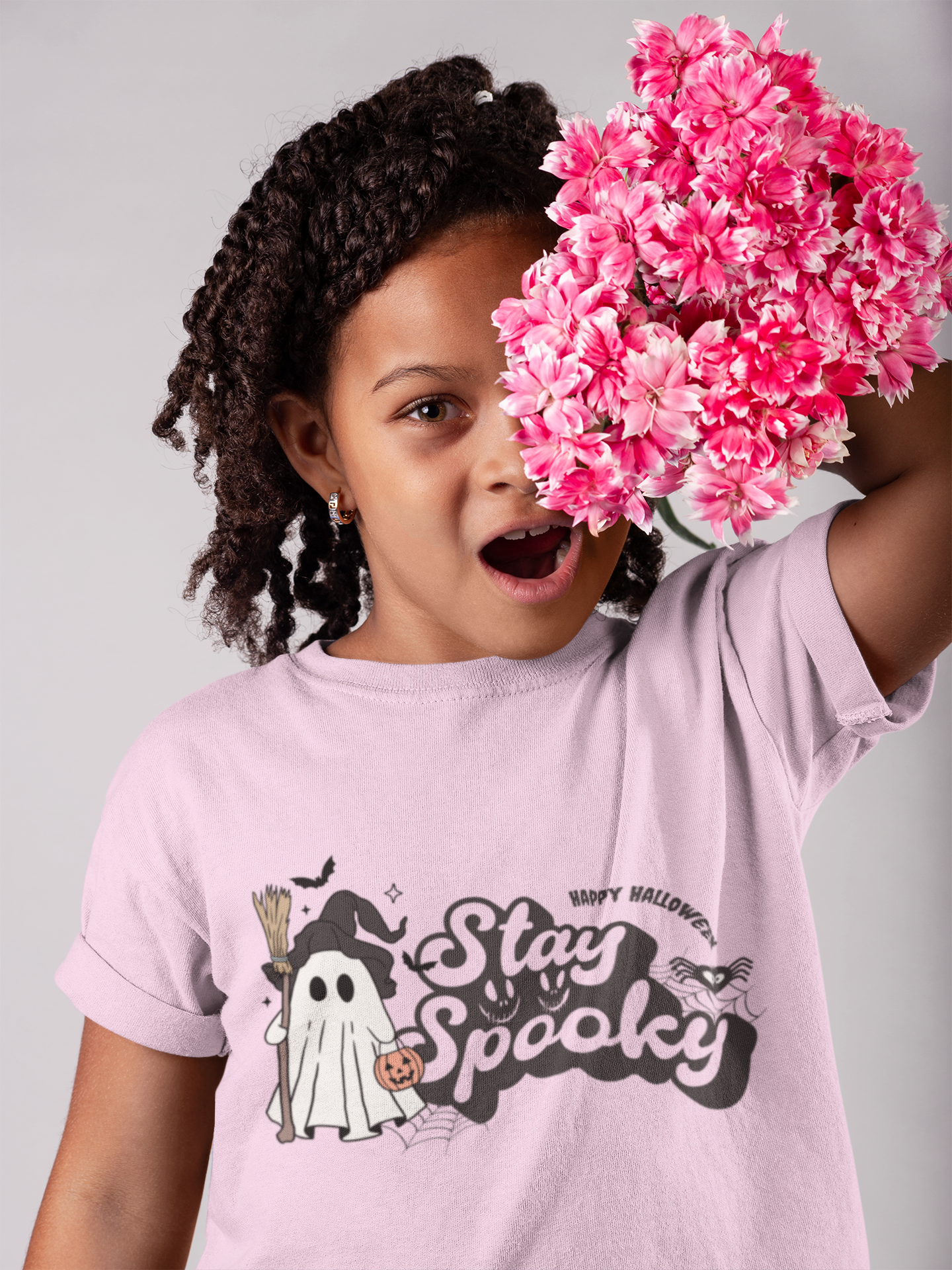 Kids unisex cotton Halloween T-shirt with ghost in witch hat holding broom and “Stay Spooky” print